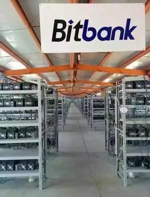 A modern mining farm showcasing multiple mining rigs