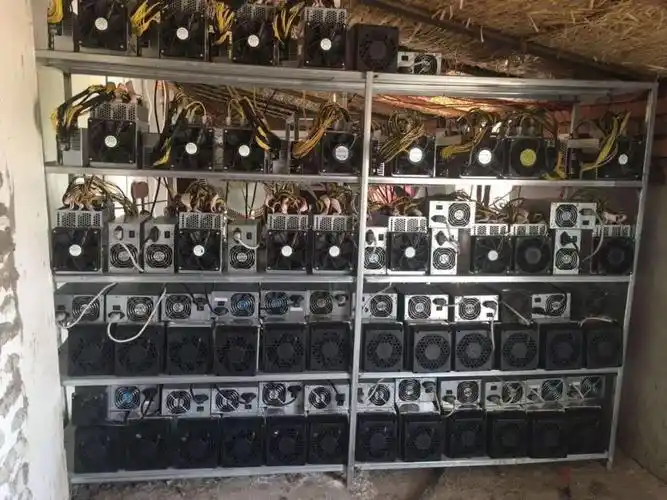 Large cryptocurrency mining farm with rows of mining machines